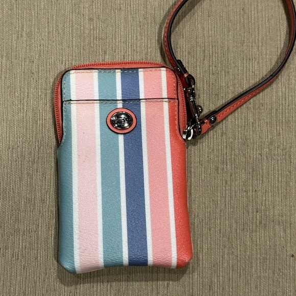 Coach Handbags - COACH “Peyton” Multi Striped wristlet with peach color interior. ‘Coastal Vibe’